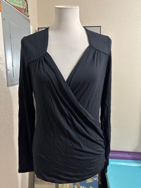 VENUS Size Medium.  Never worn. Black Long Sleeve Surplice Wrap Top